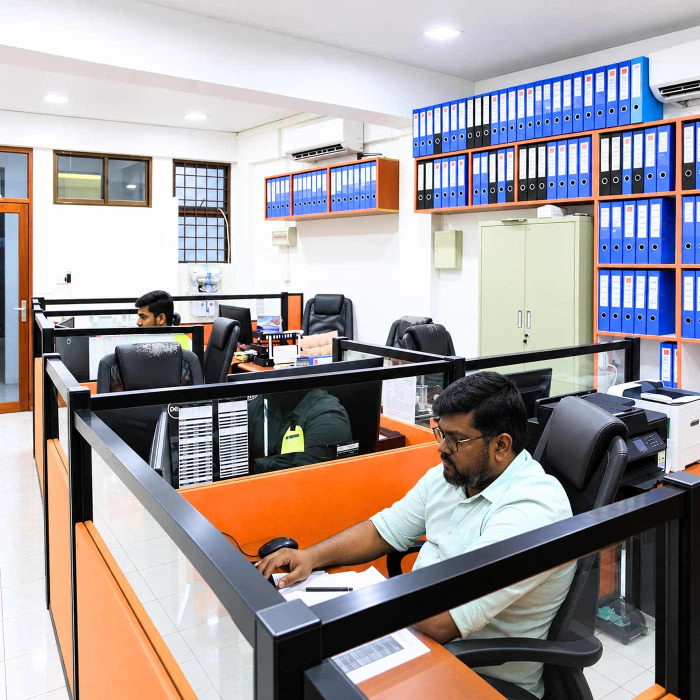 Brotherhood Group staff at work in the group's open-plan office in Malé