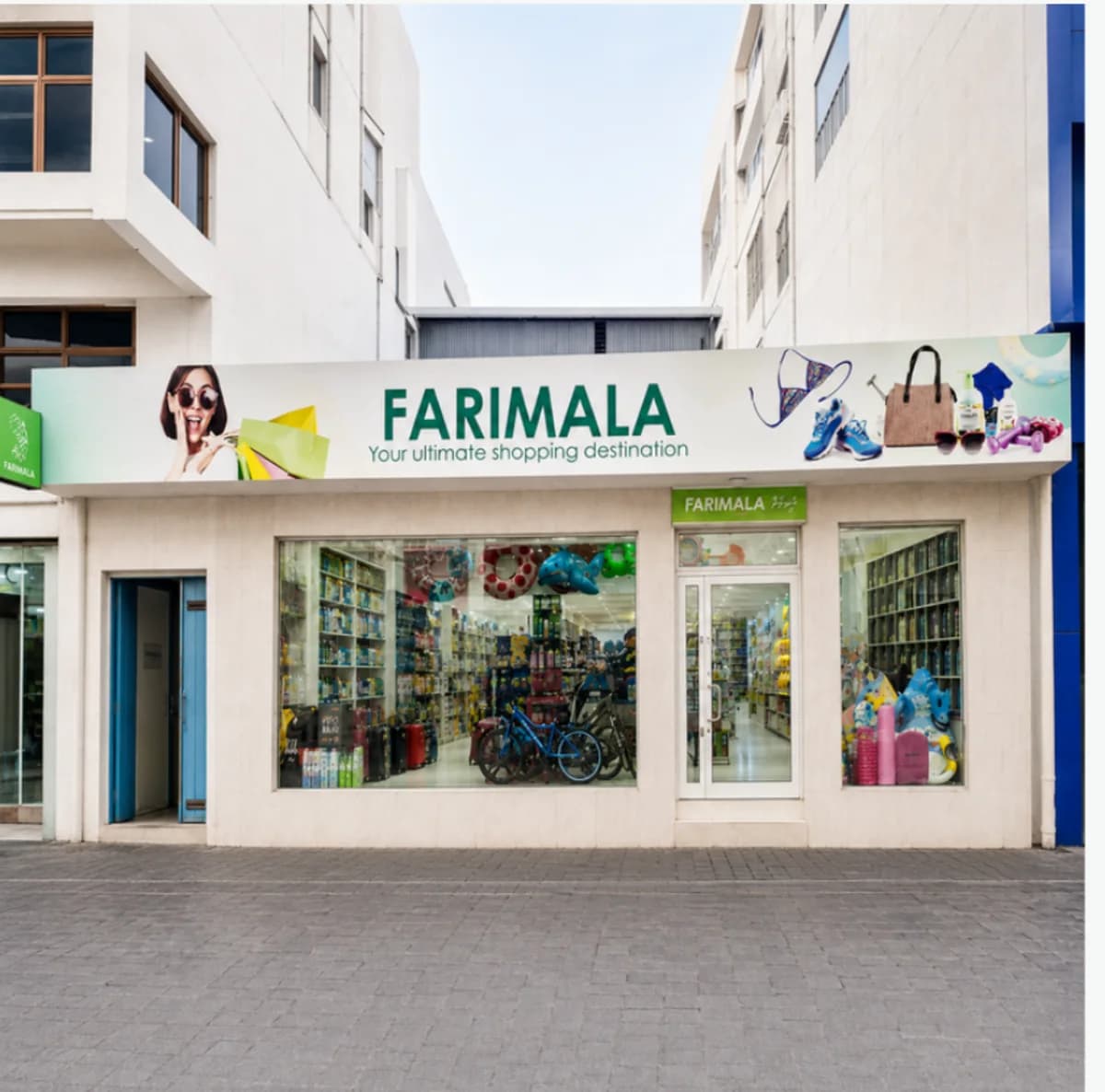 The Farimala shopfront in Malé, with its green and white signage